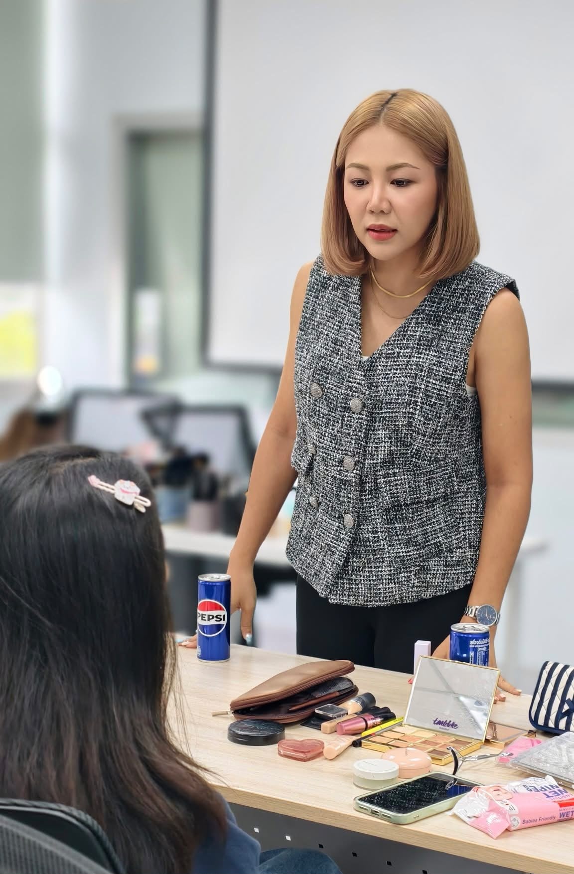 Instructor coaching a student